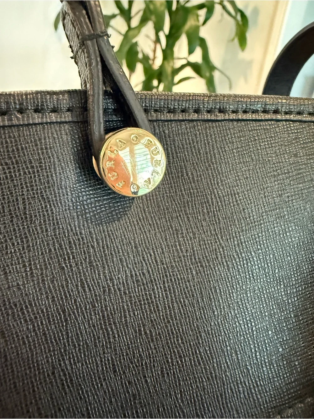 Furla downsizing figured